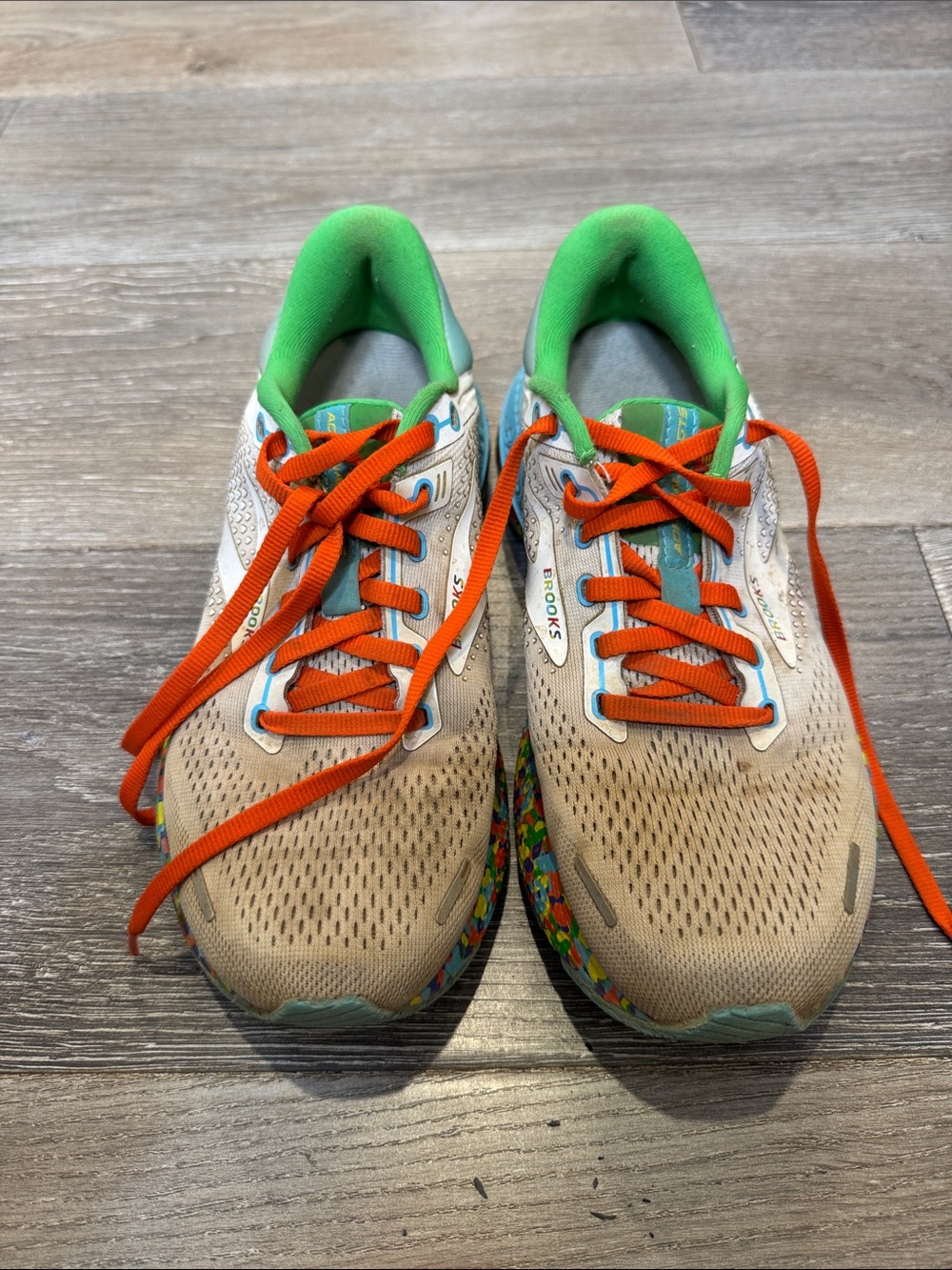 Brooks Beige Athletic Shoes with Orange Laces and Green Collar